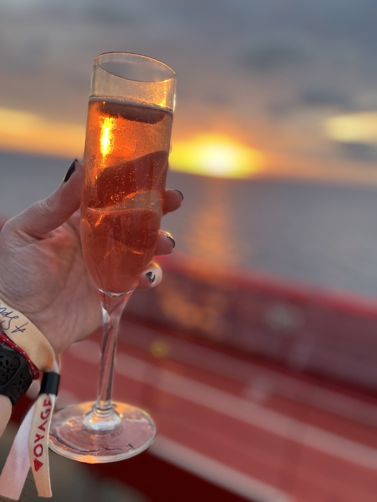 Champagne flute in front of a sunset